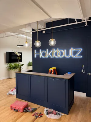Luxury Back Lit Sign - Hakibbutz is a boutique coworking space in NYC This is there first office in the United States